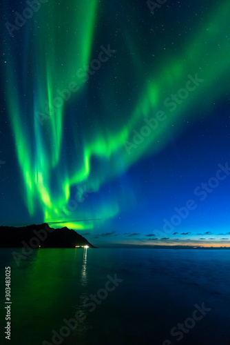 Aurora Borealis, northern lights at Tungeneset beach, Ersfjord, Senja, Norway © benna23