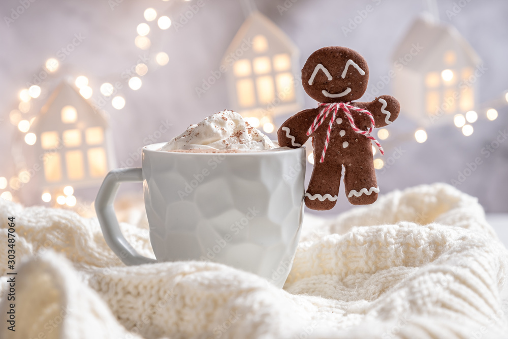 Gingerbread cookie man with a hot chocolate for Christmas holiday Gingerbread cookie man with a hot chocolate for Christmas holiday