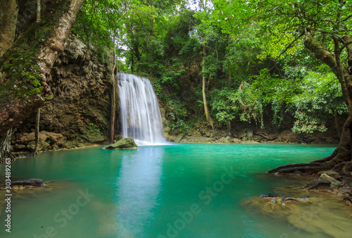 Fototapeta Naklejka Na Ścianę i Meble -  Waterfalls In Deep Forest at Erawan Waterfall in National Park Kanchanaburi Thailand