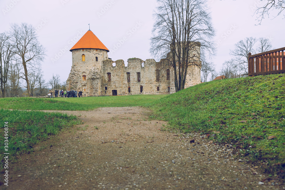 City Cesis, Latvia Republic. 13th century castle with park in late autumn. Historic building. 2. November 2019. City Cesis, Latvia Republic. 13th century castle with park in late autumn. Historic building. 2. November 2019.