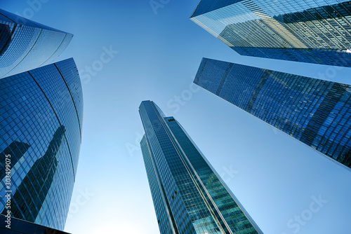 Glass skyscrapers against clear sky