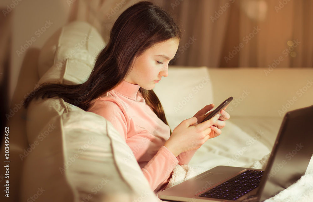 Teenage using laptop. Doing homework for school Teenage using laptop. Doing homework for school