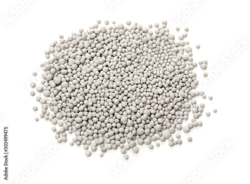 Gray fertilizer on white background