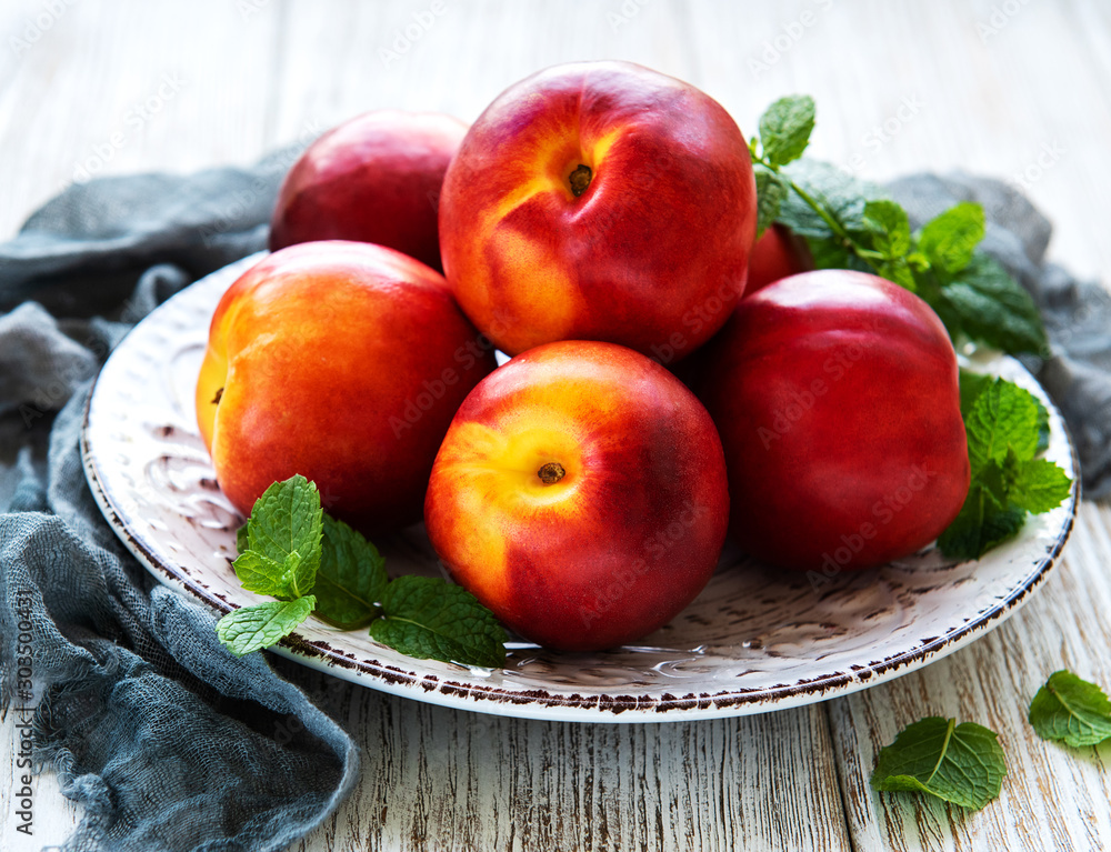 Plate with fresh nectarines Plate with fresh nectarines