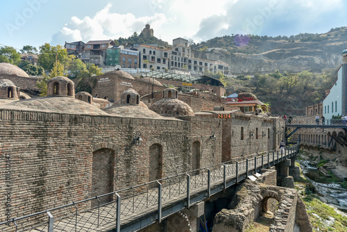 Around Sulfur baths area, colorful building and bridges in the Old Town of Tbilisi photo