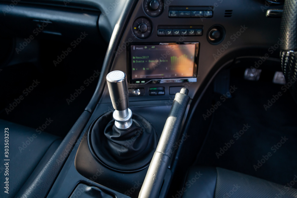 Interior of a rare Japanese sports car in the back of a gray