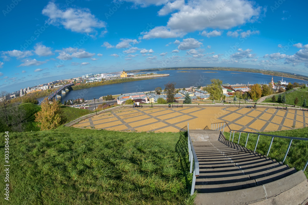 NIZHNY NOVGOROD, RUSSIA - SEPTEMBER 28, 2019: View of the city, the observation deck and a place for romantic walks in the historic territory of Old Nizhny Novgorod in the  sunny autumn day