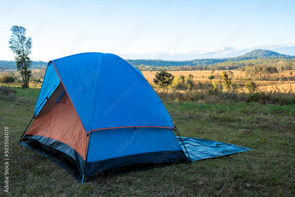 Camping Blue Tent on the mountain hill