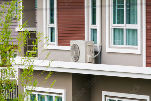 Air conditioner compressor outdoor unit installed outside the house