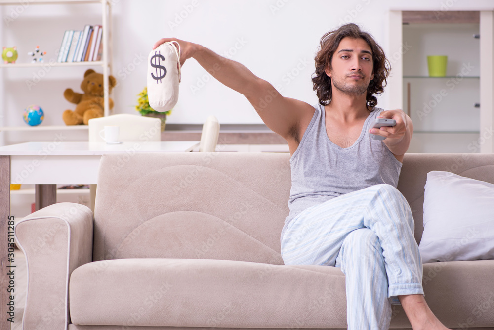 Unemployed man desperate at home Unemployed man desperate at home