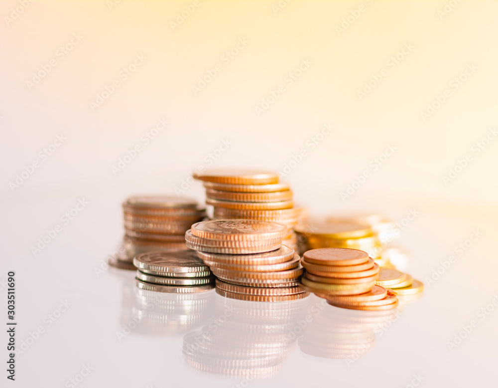 Money Coins stacked on each other in different positions. Money Coins stacked on each other in different positions.