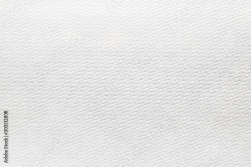 Close-up of white color tissue paper texture background abstract. Detail texture of pattern with free space copy for text. photo