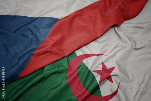 waving colorful flag of algeria and national flag of czech republic.