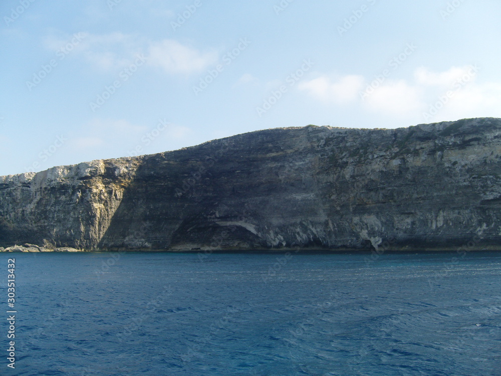 Fototapeta premium Malta steep coastal area seen from the sea