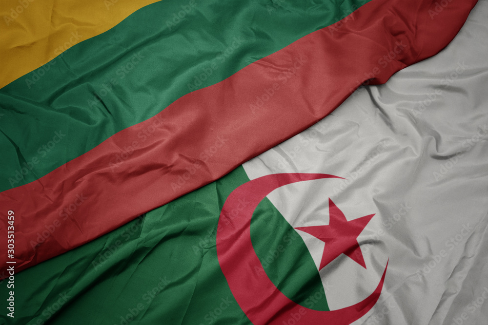 waving colorful flag of algeria and national flag of lithuania.