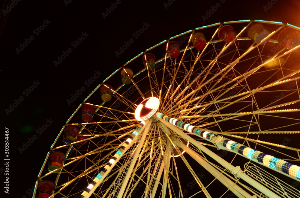Ferris wheel in an amusement park Ferris wheel in an amusement park
