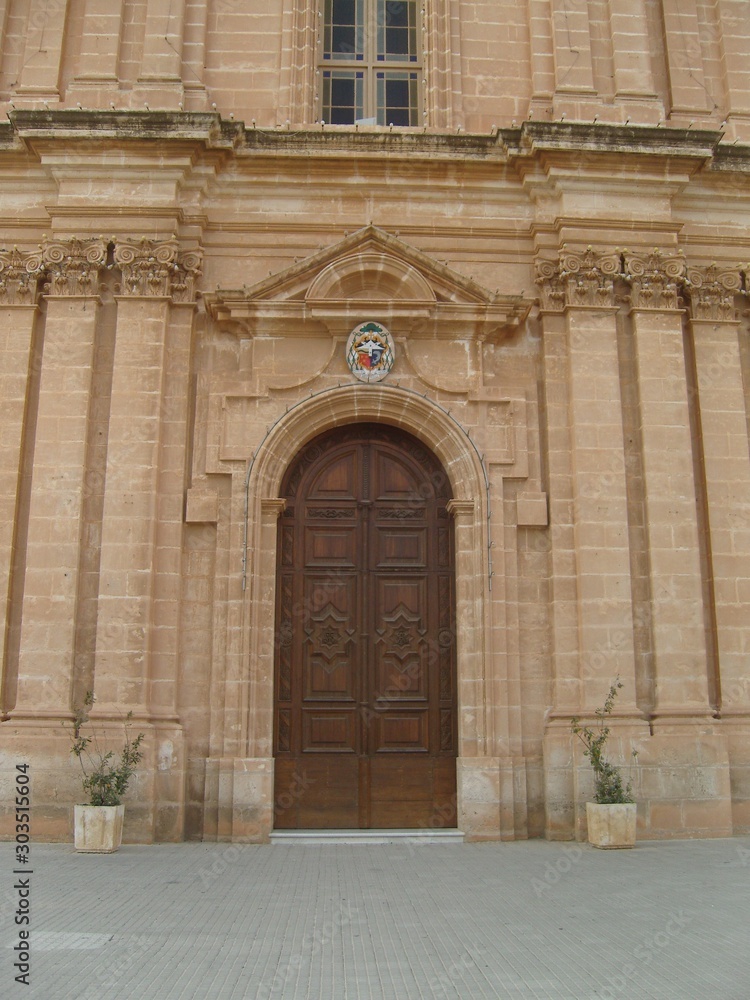 Malta La Valletta church door with nice symbol carvings