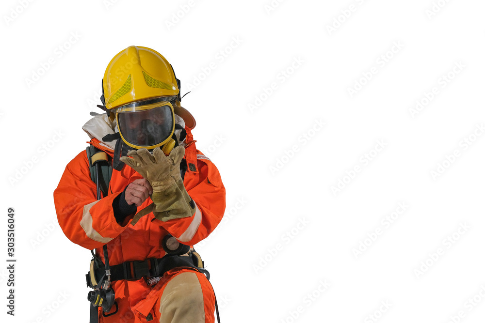 Firefighters in uniform and full-length body helmets Firefighters in uniform and full-length body helmets