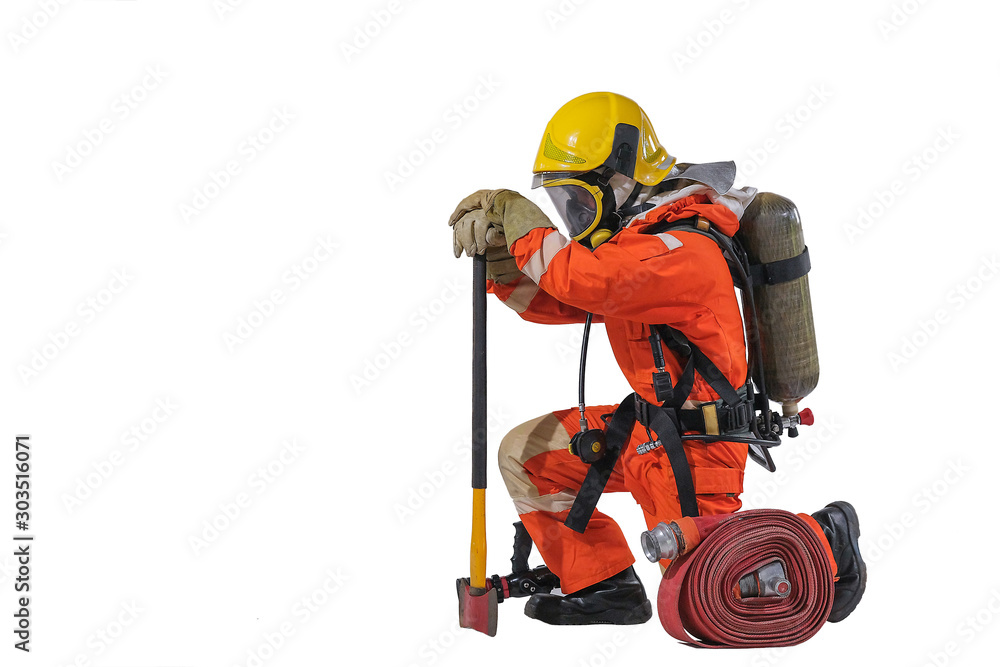 Firefighters in uniform and full-length body helmets Firefighters in uniform and full-length body helmets