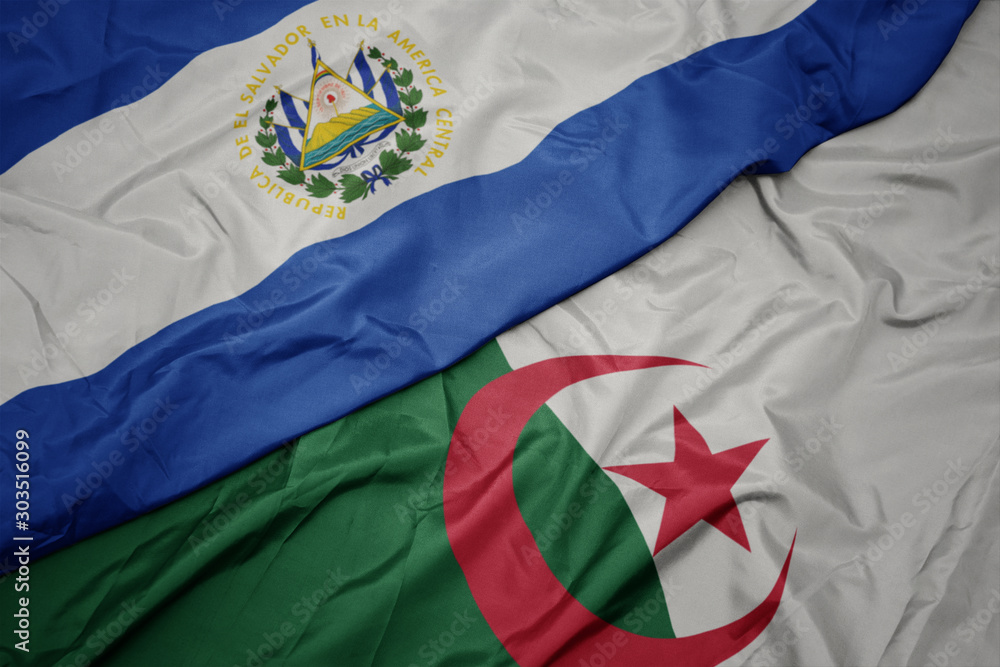 waving colorful flag of algeria and national flag of el salvador.