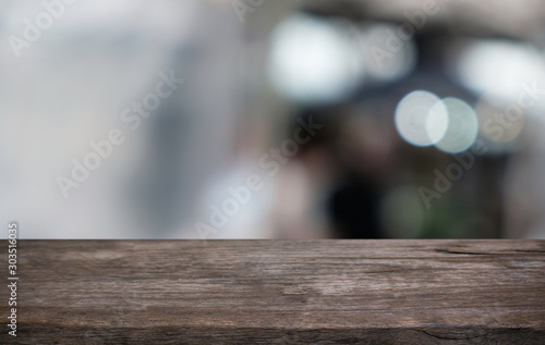 Wood Table Top in Blur Background room interior with empty copy space.