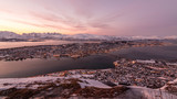 looking down to Tromsoe City at sunset