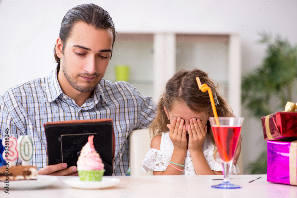 Father celebrating birthday with his daughter Father celebrating birthday with his daughter