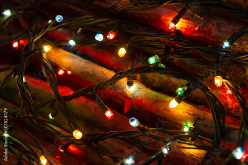 Christmas / New Year`s lights on dark background, for postcards, horizontal