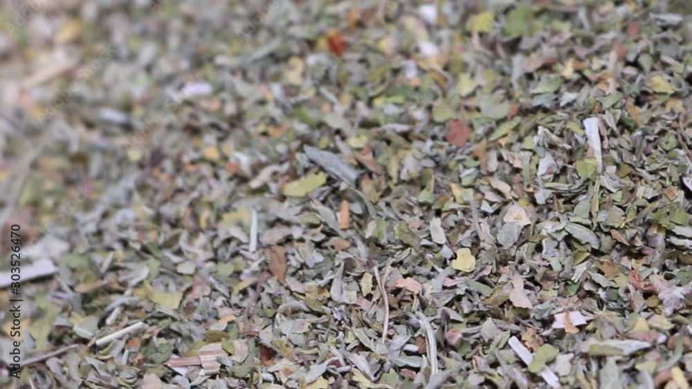 Close up of catnip, organic, dried, cut and sifted, panning in circular motion. Close up of catnip, organic, dried, cut and sifted, panning in circular motion.