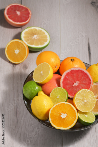 Assortment Of Citrus Fruit on Wooden Table