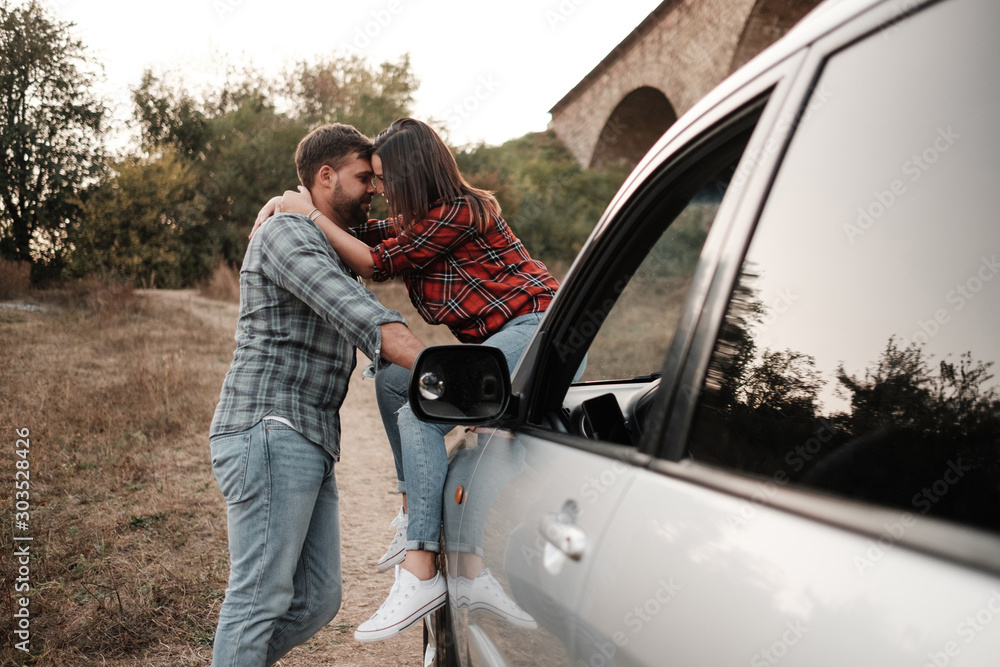 Happy Traveling Couple Together Enjoying Road Trip, Vacation Concept, Holidays Outside the City, Two Cheerful People Happy Traveling Couple Together Enjoying Road Trip, Vacation Concept, Holidays Outside the City, Two Cheerful People