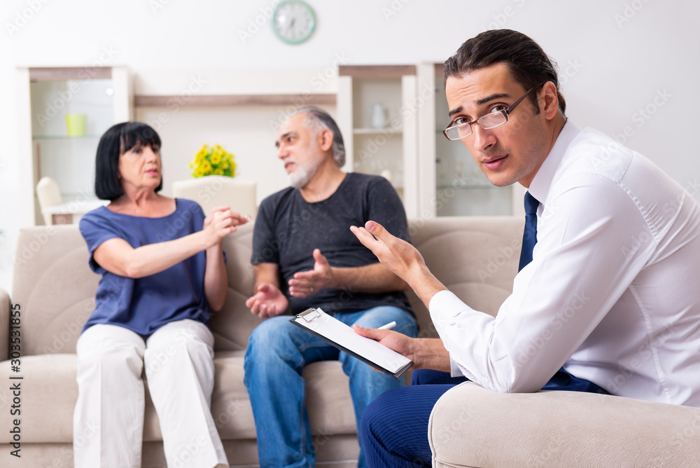 Old couple visiting psychiatrist doctor Old couple visiting psychiatrist doctor