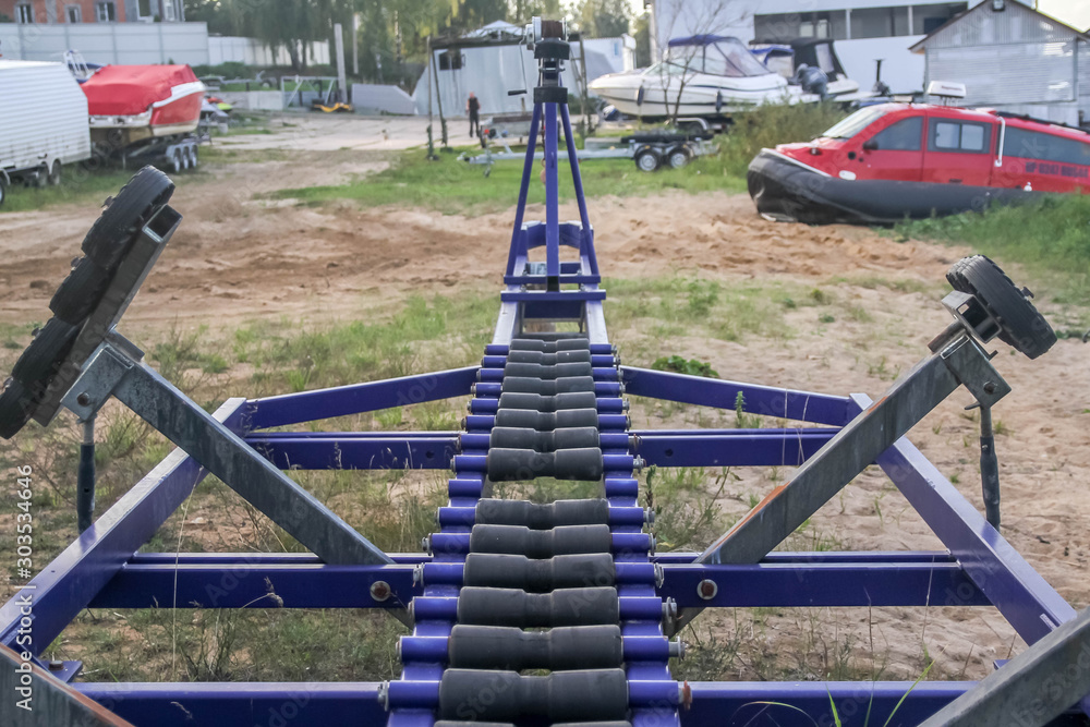 The device for transporting boats at the boat station, the pier at the river Bank, the sea. The device for transporting boats at the boat station, the pier at the river Bank, the sea.