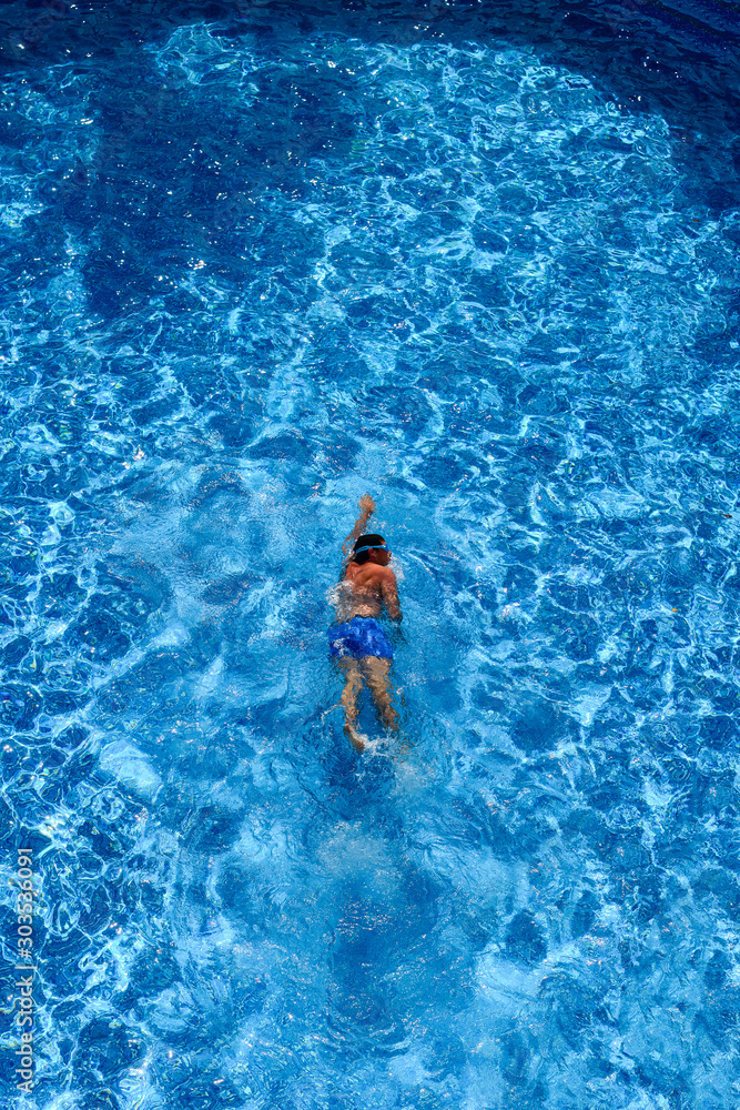 Top view of a man in swimming pool
