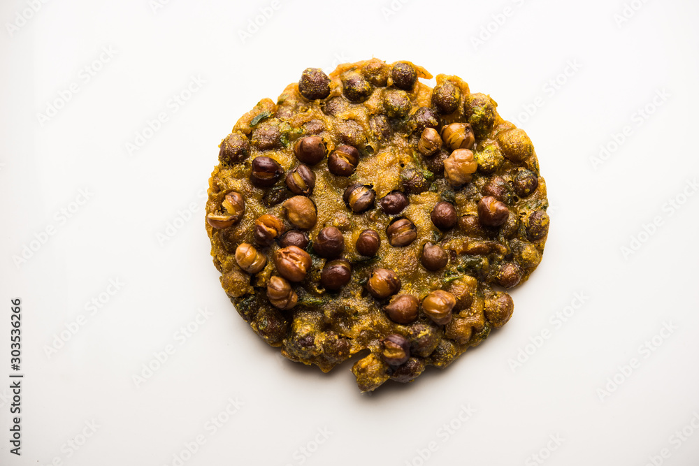 Chana Dal Bhabra / Babra served with tomato ketchup, popular food from Bihar / Bhojpur of India Chana Dal Bhabra / Babra served with tomato ketchup, popular food from Bihar / Bhojpur of India