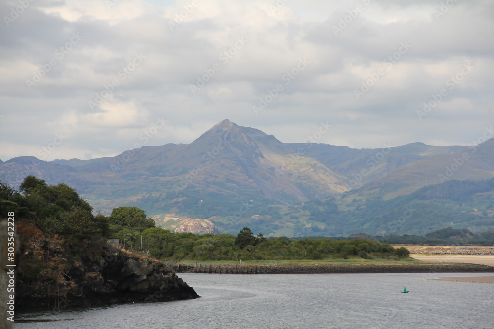 Landscape view over Bort y guest towardds the Snowdonia mountain range in Wales.
