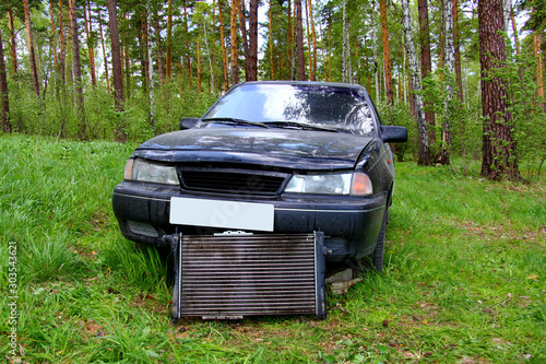 Failure of the radiator cooling the car in the woods in the summer