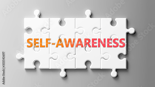 Self awareness complex like a puzzle - pictured as word Self awareness on a puzzle pieces to show that Self awareness can be difficult and needs cooperating pieces that fit together, 3d illustration photo