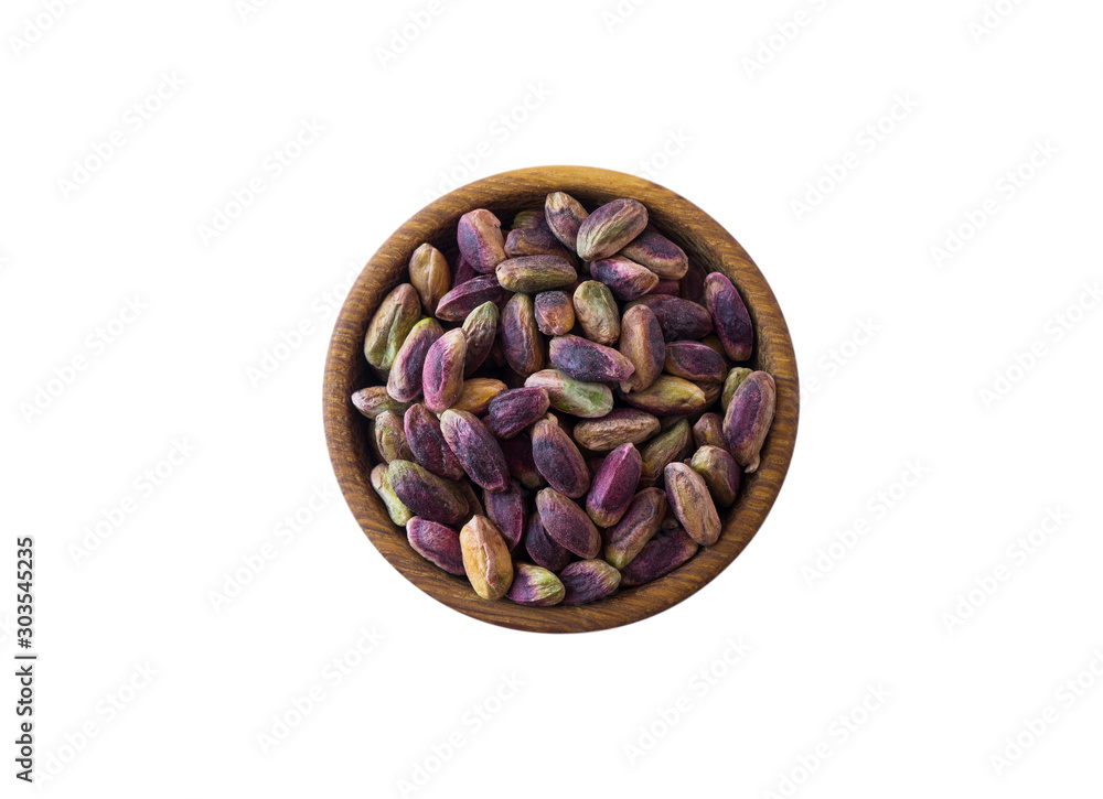 Studio shot of pistachios on white background. Pistachios in nutshell on wooden bowl isolated on white. Pistachios with copy space for text. Nuts close-up. Top view. Studio shot of pistachios on white background. Pistachios in nutshell on wooden bowl isolated on white. Pistachios with copy space for text. Nuts close-up. Top view.