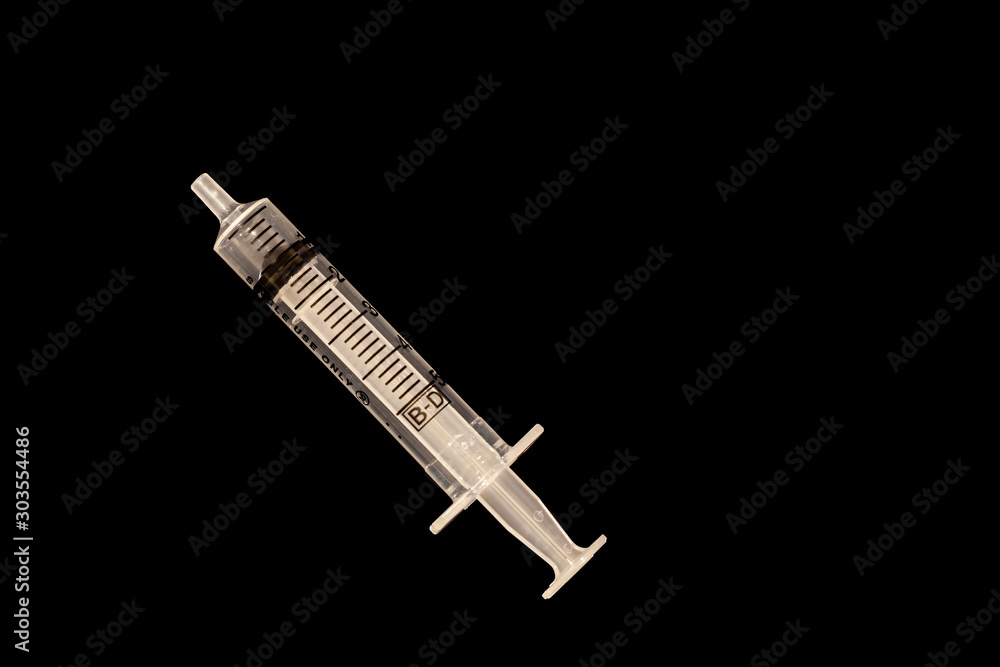 5ml syringe on black background 5ml syringe on black background