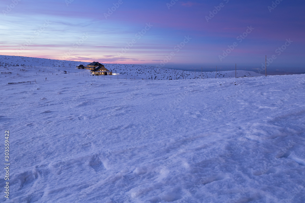 Winter landscape of the Krkonose during a fullmoon night in winter
