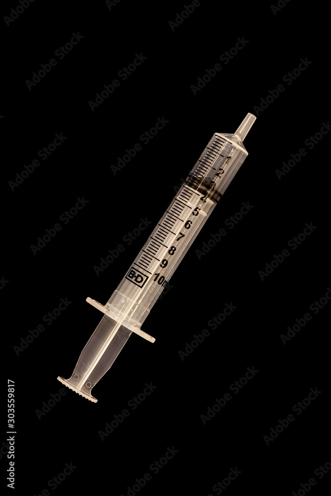 10ml syringe on black background 10ml syringe on black background