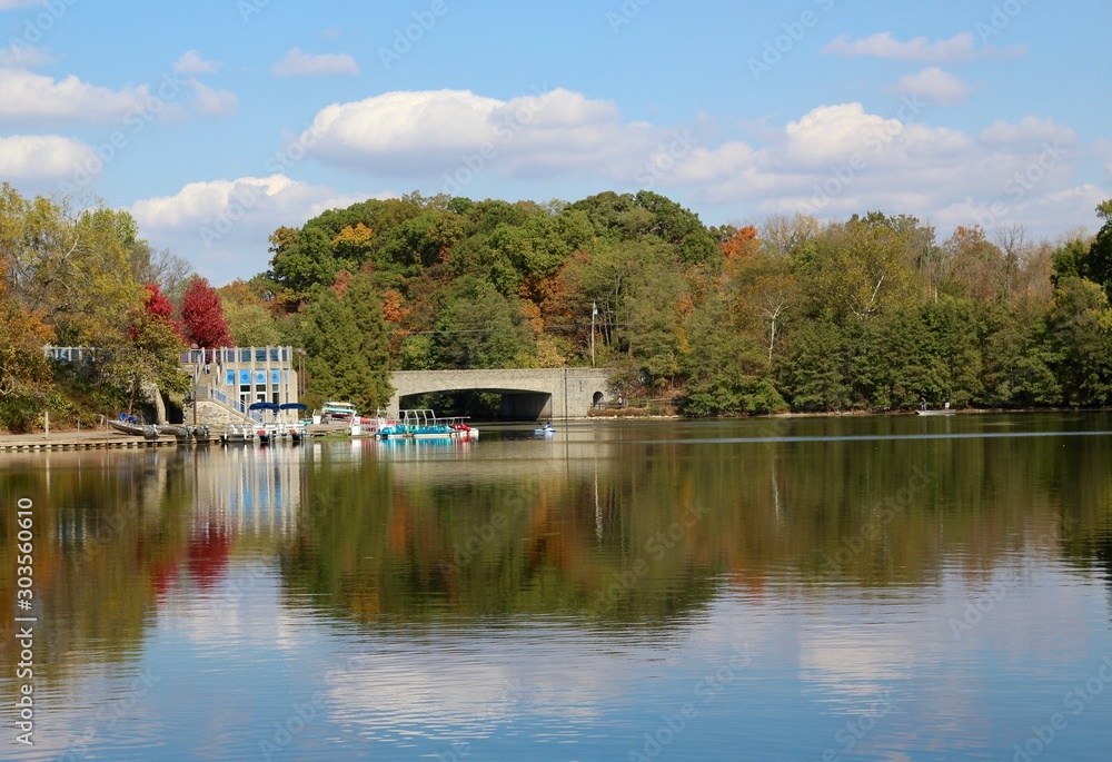 A beautiful autumn view of the lake in the park.