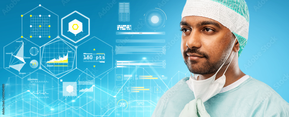 medicine, surgery and people concept - close up of indian male doctor or surgeon with protective mask over virtual charts projection on blue background medicine, surgery and people concept - close up of indian male doctor or surgeon with protective mask over virtual charts projection on blue background