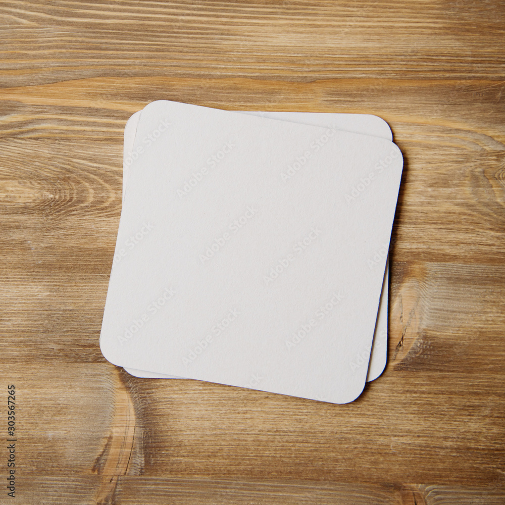 empty blank cardboard beermat on wood mockup empty blank cardboard beermat on wood mockup