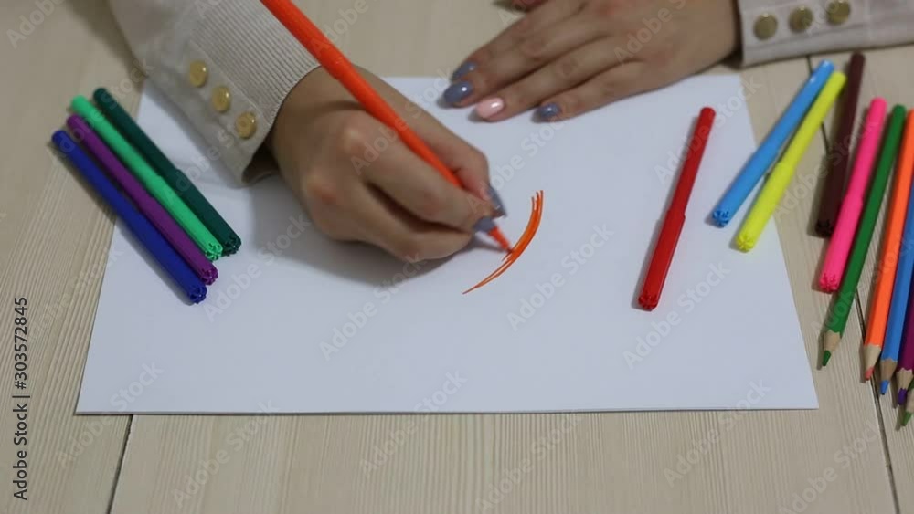 Hands draw with felt-tip pens. Concept of creative hobby, painting inspiration, art learning. Footage. Hands draw with felt-tip pens. Concept of creative hobby, painting inspiration, art learning. Footage.