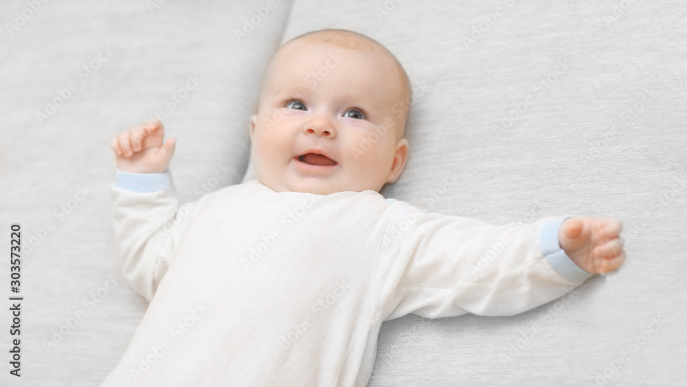 top view. beautiful baby lying on the couch top view. beautiful baby lying on the couch