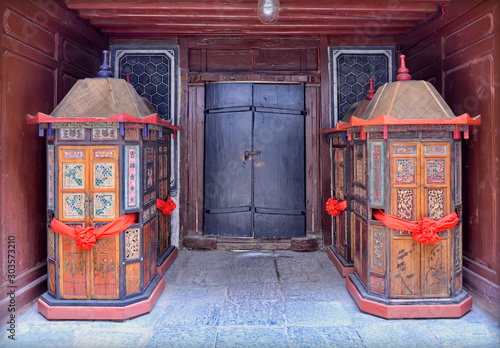 Fényképezés Old palanquins at the door