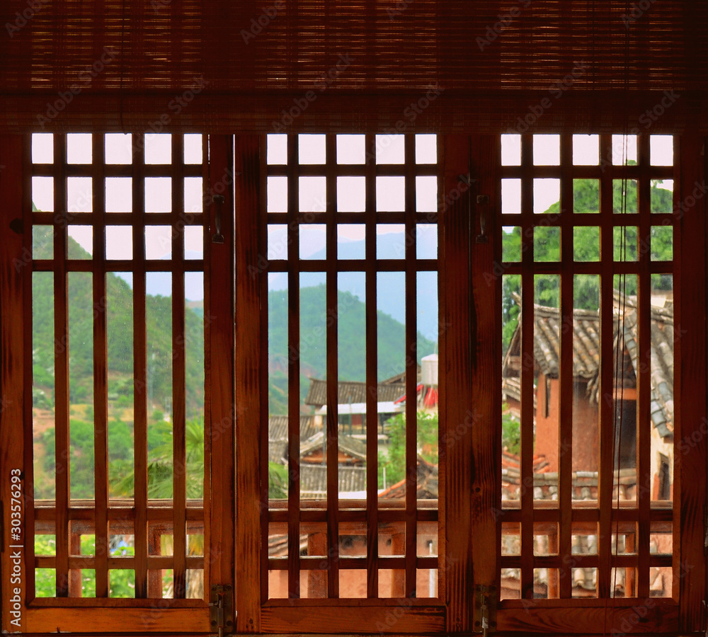 Window in a house of Nuodeng village, Yunnan, China Window in a house of Nuodeng village, Yunnan, China
