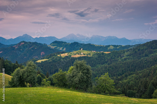 Church on the hill on a beautiful day in Sveti Tomaz, Skofja Loka, Slovenia